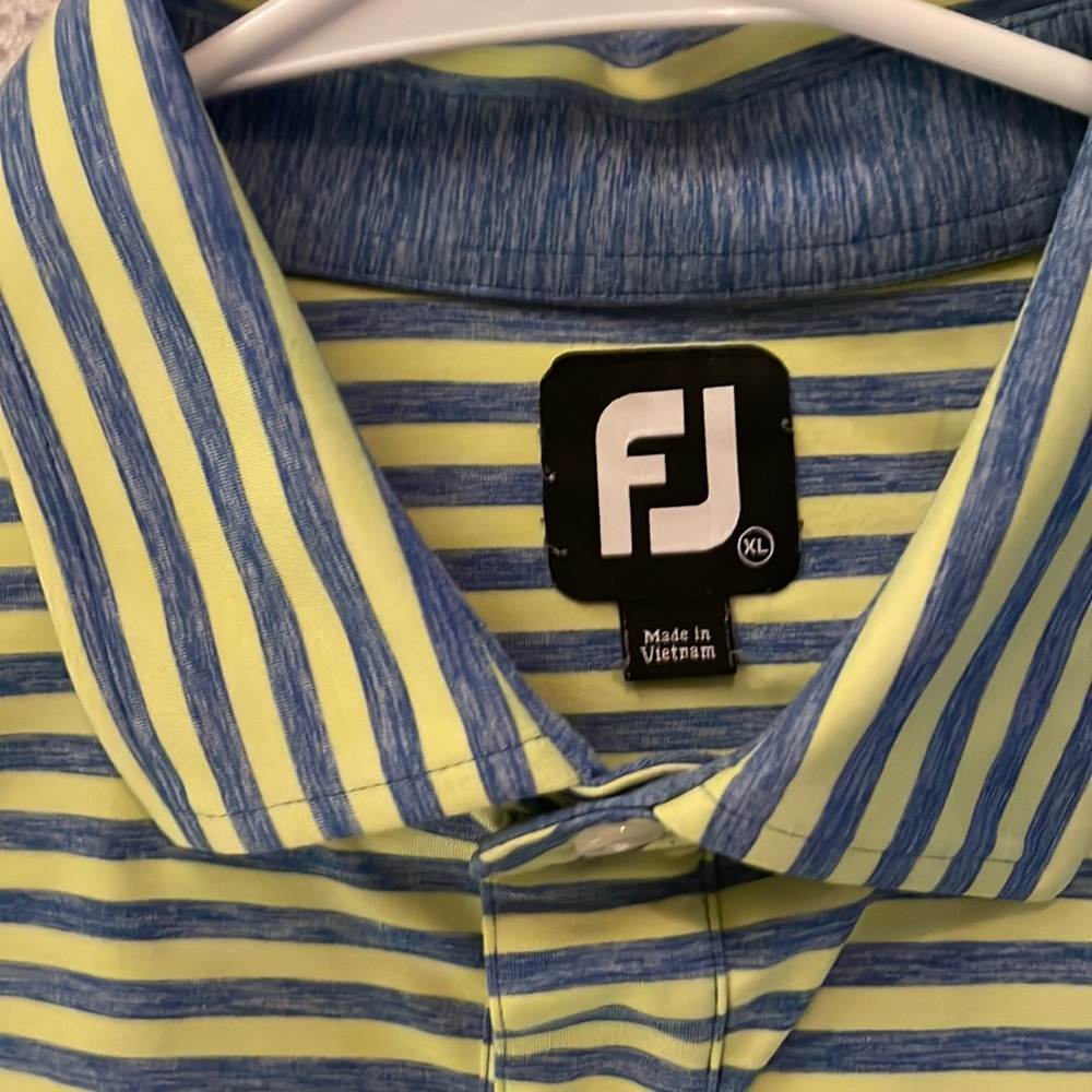 FootJoy golf polo - blue with yellow stripes. Excellent condition